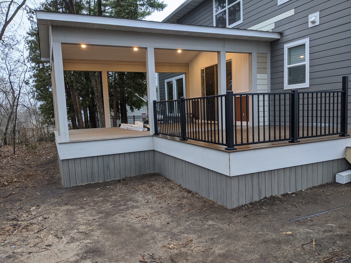 Classic looking front patio with lighting installed by Home Visions Carpentry