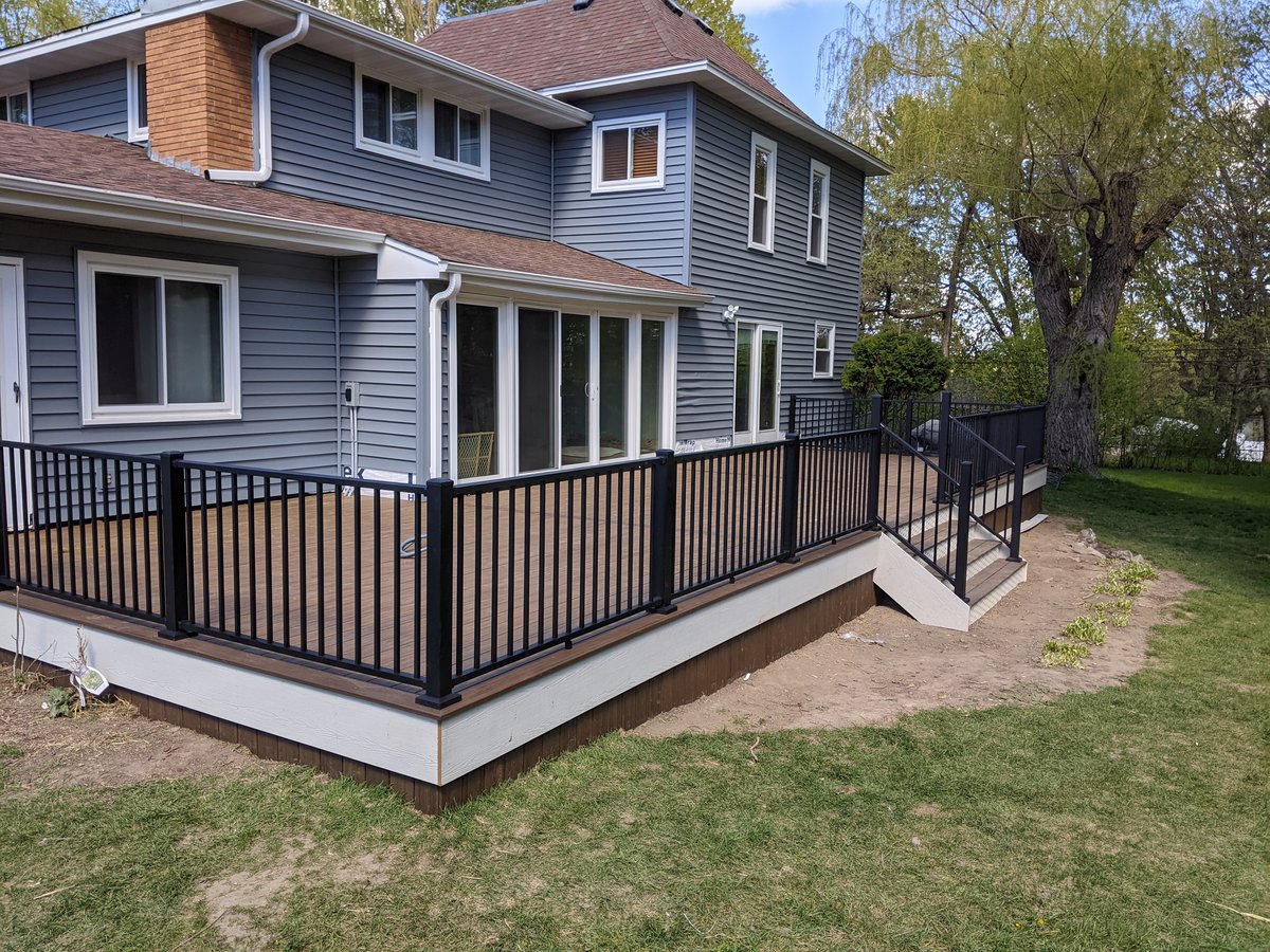 Clean-lined deck with outdoor dining area, perfect for Minnesota summers